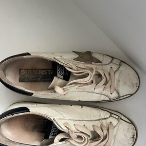Golden Goose Cream and Black Superstar Sneakers